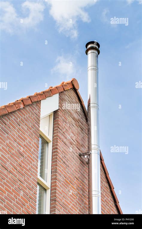 Metal Chimney Pipe On Facade Of House Stock Photo Alamy