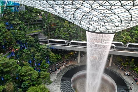 Jewel Changi Airport HSBC Rain Vortex and Skytrain Editorial Photo ...