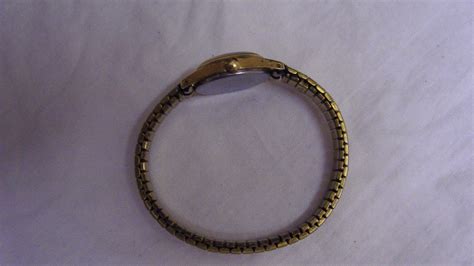 Vintage Timex Base Metal Bezel Stainless Steel Back Stretch Band Ladies Wat