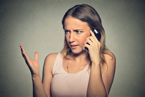 Upset Angry Skeptical Unhappy Serious Woman Talking On Mobile Phone