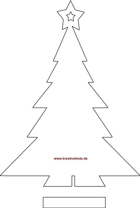 A Christmas Tree Cut Out From Paper With Stars On The Top And Bottom