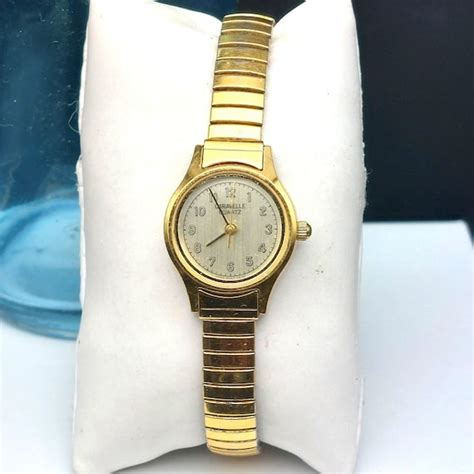 Vintage Caravelle By Bulova Quartz Watch Women Gold T Gem