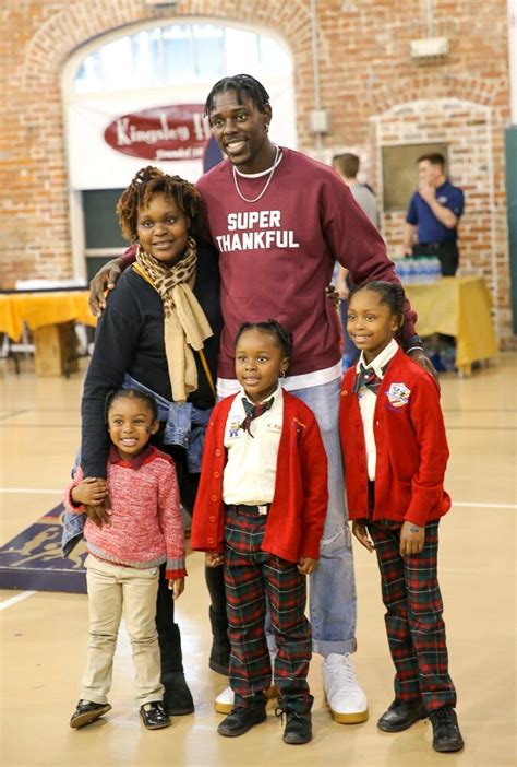 Photos: Jrue Holiday and family give thanks to local families Photo ...