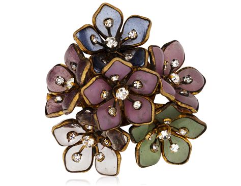 CHANEL MULTICOLOR GLASS AND RHINESTONE FLOWER BROOCH, | Christie’s