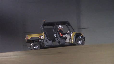 Caterpillar Demos Its Seat Utvs And Cr Mini Excavator Youtube