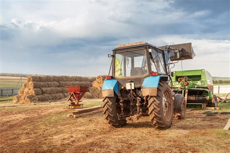 Premium Photo | Agricultural machinery equipment tractor and seeder and ...