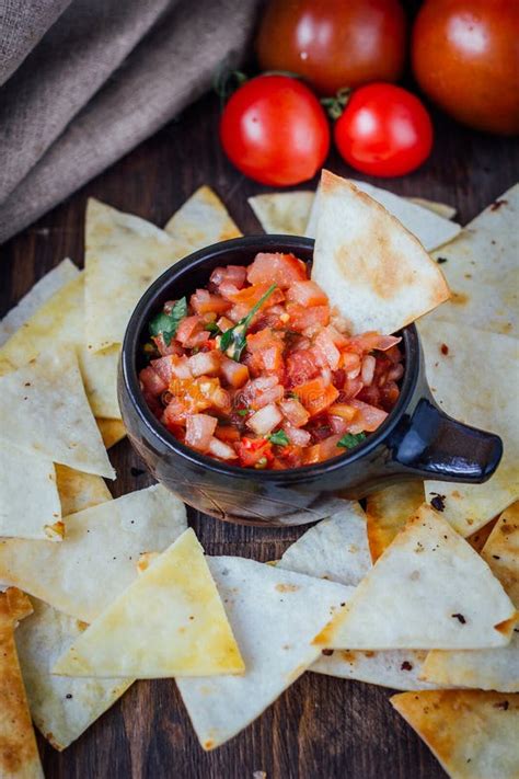 Hot Mexican Salsa Spicy Dip With Nachos Chips From Corn Stock Photo