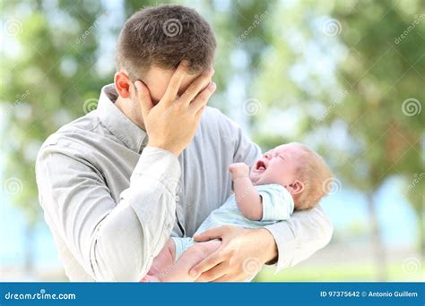 Worried Father and Baby Crying Stock Photo - Image of background ...