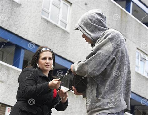 Man Mugging Woman in Street Stock Image - Image of flats, crime: 10401215