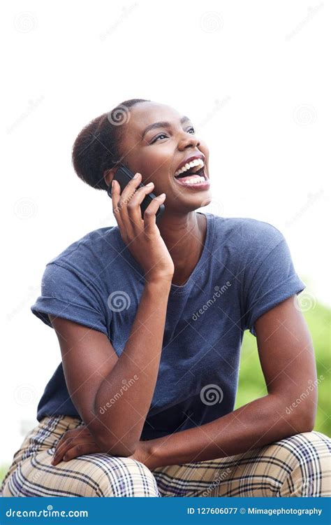 Attractive Young African American Woman Talking On Cellphone And