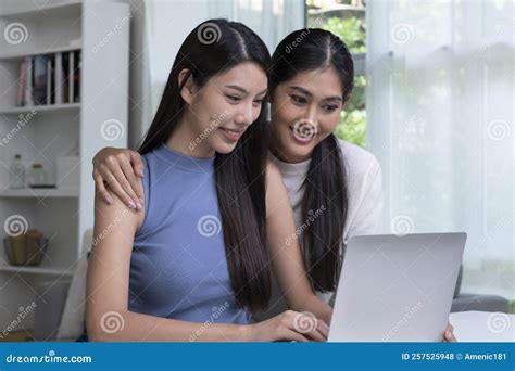 Asian Lesbian Couple Communicating Online On Laptop Lgbt Lesbian Couple Embracing Watching