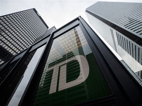 TD BMO Downgraded On Earnings Headwinds Uncertain Acquisition