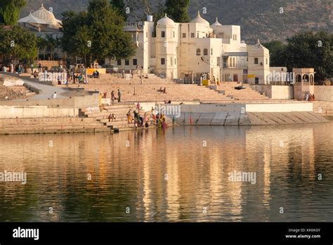 sacred lake  pushkar  surrounded  bathing ghats  temples