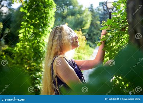 Pretty Teenage Girl 14 16 Year Old With Curly Long Blonde Hair In