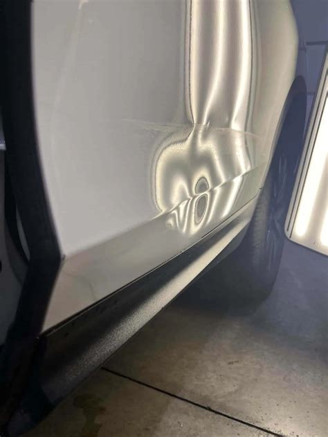 how to remove a dent from car door 9