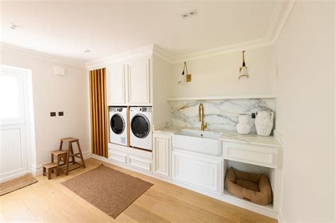 Transforming Handmade Cabinets into Secret Utility Room Entrances