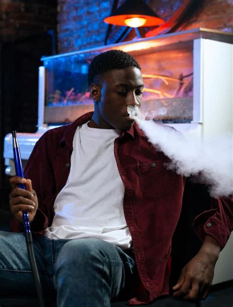 Smoking Cigarettes Ban Fires Up Debates