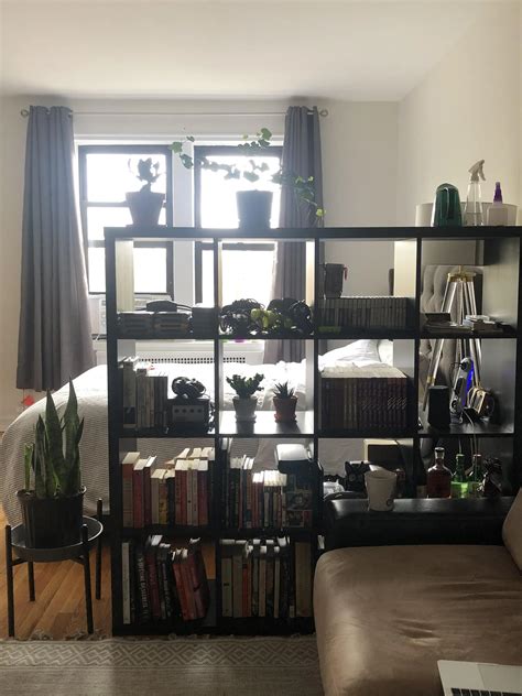 Cozy bookcase/bed area in my NYC studio | Scrolller