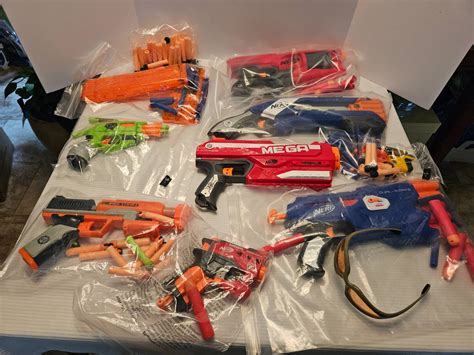 Lot #122 - Nerf Guns: Mega Magnus, Doublestrike, Zombie Strike, Mega ...