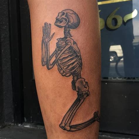 Praying Skeleton Tattoo Designs