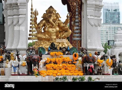 Flower Offering At A Hindu Temple In Thailand Ganesh Statue Crafted