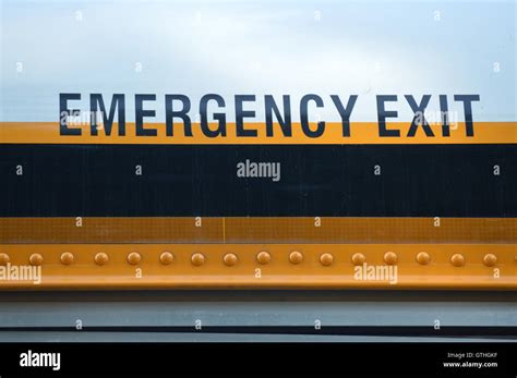 Emergency Exit sign on a school bus Stock Photo - Alamy