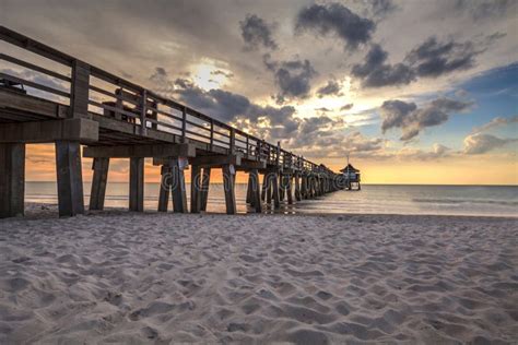 Naples Pier on the Beach at Sunset Stock Photo - Image of gulf, coastal ...