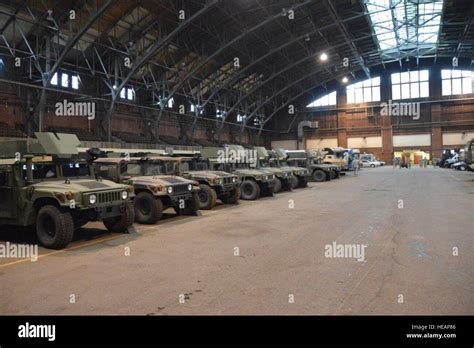 BUFFALO, NY-- New York Army National Guard vehicles lined up ready to be used to aid civil ...