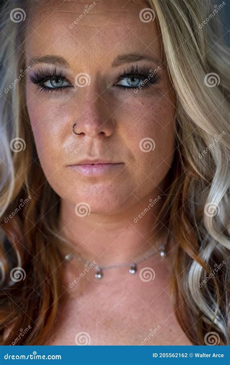 Gorgeous Blonde Model Poses Nude In A Home Environment Stock Photo