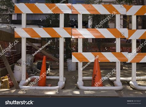 Caution Barriers And Orange Cones At A Construction Site Stock Photo