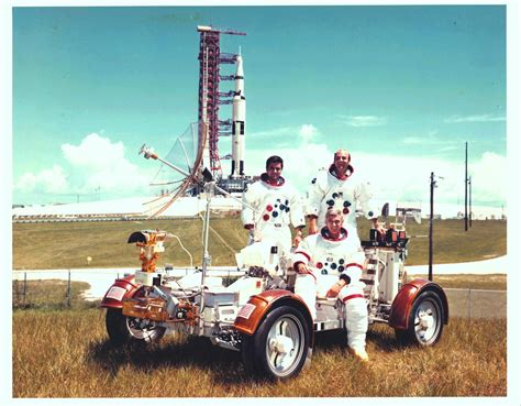 The Apollo 17 crew poses with their launch vehicle by ButchC on DeviantArt