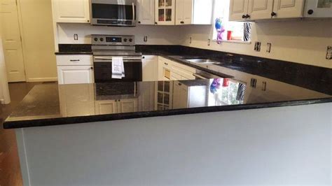 White Cabinets With Volga Blue Granite 4 Granite Backsplash In