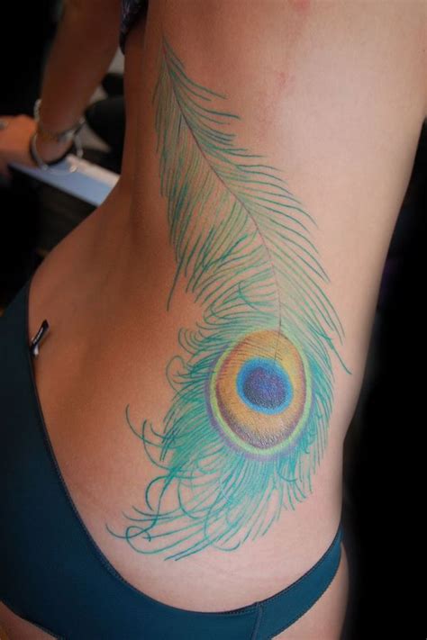 Beautiful Peacock Feather Tattoo Ideas And Their Meaning