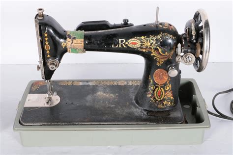 Antique Singer 66 Red Eye Treadle Sewing Machine | EBTH