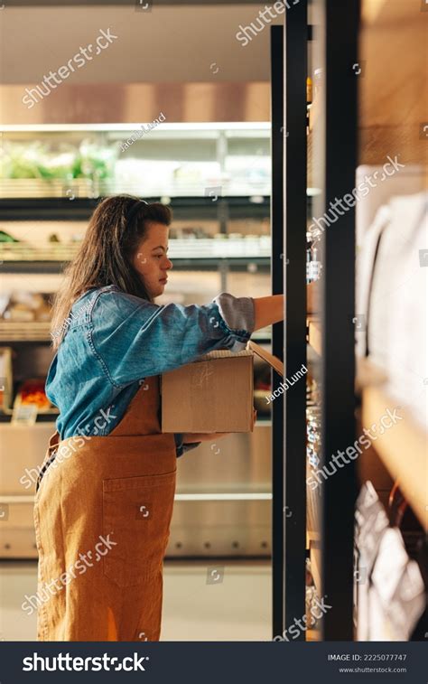 Grocery Store Worker Down Syndrome Restocking Stock Photo 2225077747