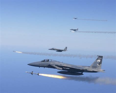 Fox 1 Away Four F 15s Firing Live Air To Air Missiles At The Same