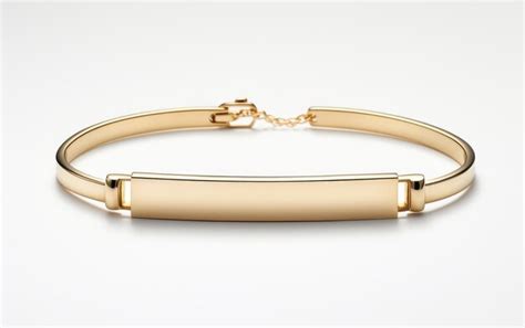 Premium Photo | Gold Bracelet With Name Tag