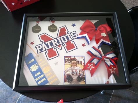 An Image Of A Display In A Frame With Ribbons And Medals Around It That