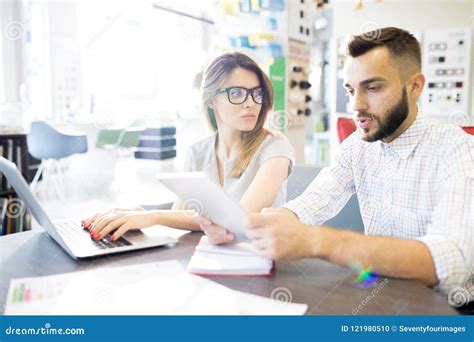 Two Sales Managers Working In Shop Stock Photo Image Of Modern Sell