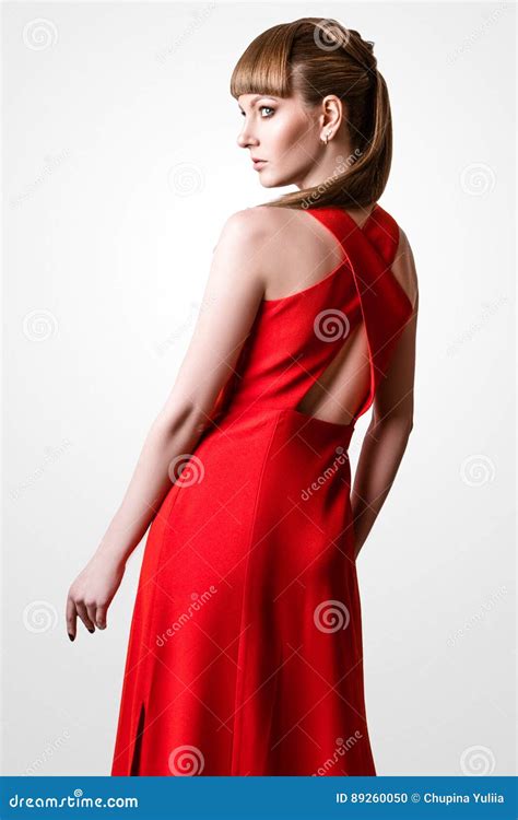 Beautiful Woman Model Posing In The Studio On White Background Stock