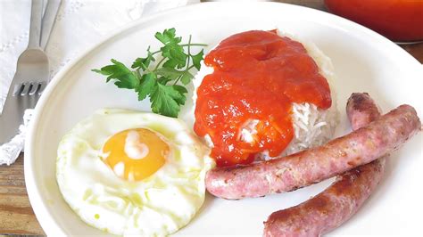 Cómo preparar un delicioso arroz con tomate huevo y salchichas de