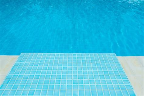 Premium Photo | Blue tile at swimming pool