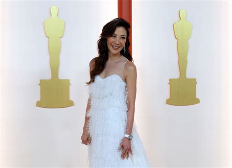 Watch Michelle Yeoh FaceTime Her Mother Following Historic Oscars Win ...