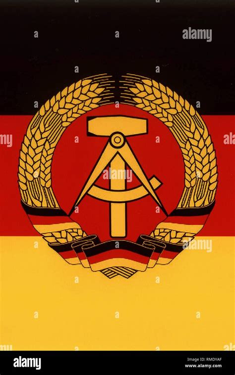 National Flag Of The Gdr And State Emblem With The Components Of The Hammer Compass And Ring