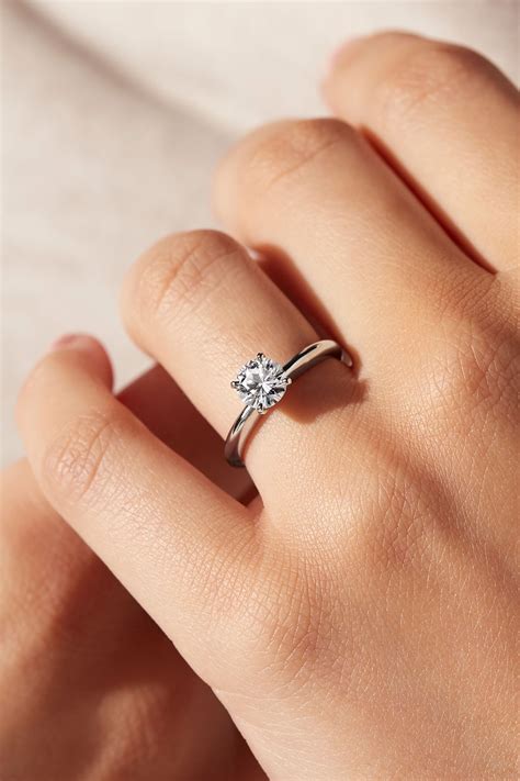 Let Your Diamond Shine Brilliantly In This Classic Platinum Four Prong