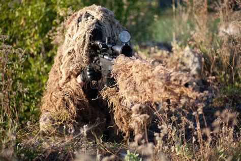 Sniper in Ghillie Suit with Precision Rifle with Optic Sight Stock ...