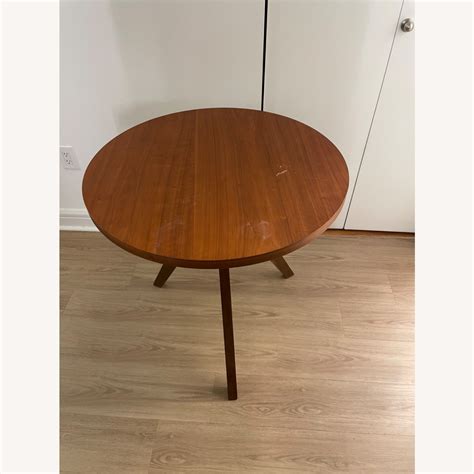 West Elm Tripod Dining Table In Walnut AptDeco