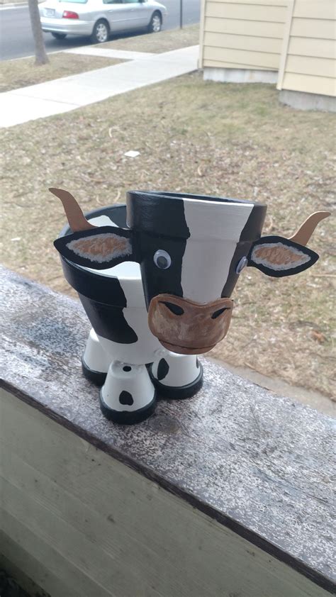 One Of My Cow Planters Clay Pot Projects Clay Flower Pots Flower