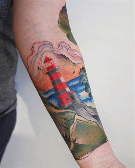 Watercolor Style Lighthouse Tattoo Placed On The Inner