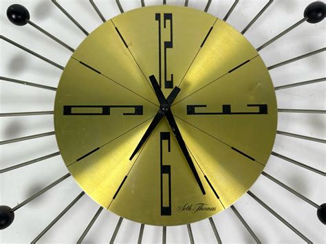 Vintage Mid Century Modern Sunburst Wall Clock By Seth Thomas Random